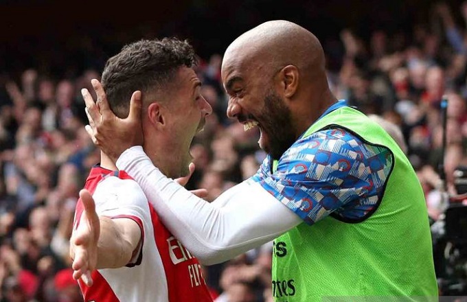 2022-04-23T133750Z_2009299204_UP1EI4N10MUOU_RTRMADP_3_SOCCER-ENGLAND-ARS-MUN-REPORT